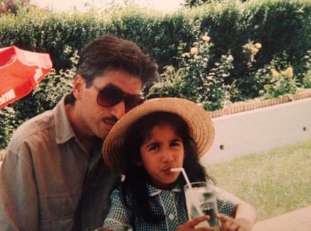 Jai Brahmbhatt sitting extracurricular pinch 1 of his daughters.