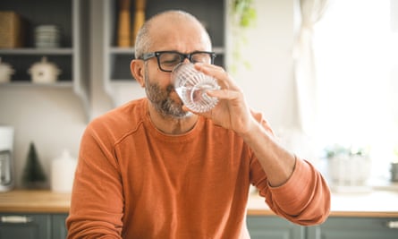 A man drinking water