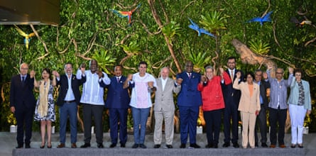(L-R) Norway's Special Envoy of the Ministry of Climate and Environment, Hans Brattskar, Peru's Foreign Minister Ana Cecilia Gervasi, Ecuador's Foreign Minister Gustavo Manrique, Guyana's Prime Minister Mark Phillips, Congo's President Denis Sassou Nguesso, Para State Governor Helder Barbalho, Brazil's President Luiz Inacio Lula da Silva, Democratic Republic of Congo's President Felix Tshisekedi, Saint Vincent and the Grenadines' Prime Minister Ralph Gonsalves, COP28's President-designate United Arab Emirates's Sultan Ahmed Al Jaber, Venezuela's Vice-President Delcy Rodriguez, Bolivia's Foreign Minister Rogelio Mayta, Suriname's Foreign Minister Albert Ramdin and France's ambassador to Brazil Brigitte Collet pose for the official photo of the Amazon Summit at the Hangar Convention Centre in Belem, Para State, Brazil, on August 9, 2023.