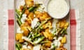Yotam Ottolenghi’s smashed potatoes with ranch dressing and charred green beans.
