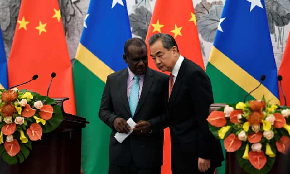 Solomon Islands foreign minister, Jeremiah Manele, with China’s foreign minister Wang Yi.