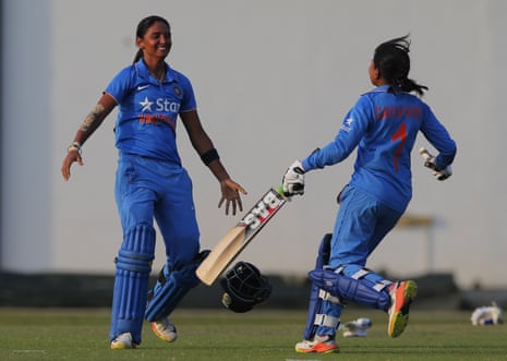 India’s Harmanpreet Kaur, left, and Rajeshwari Gayakwad celebrate after defeating South Africa in the women’s world cup qualifier final one-day international cricket match in Colombo in February.