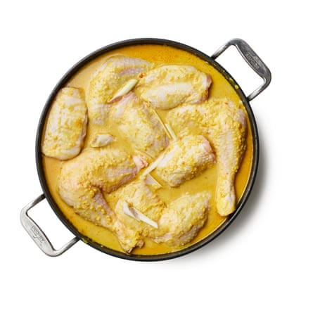 Felicity Cloake’s perfect chicken rendang. Stir in the remaining coconut milk, tamarind water and sugar, then add the chicken to the pot, pushing it down into the sauce.