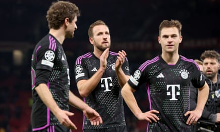 Harry Kane (centre) and his Bayern Munich teammates applaud fans after their Champions League victory at Old Trafford.