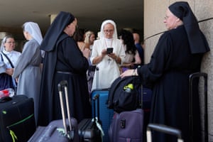Nuns with suitcases