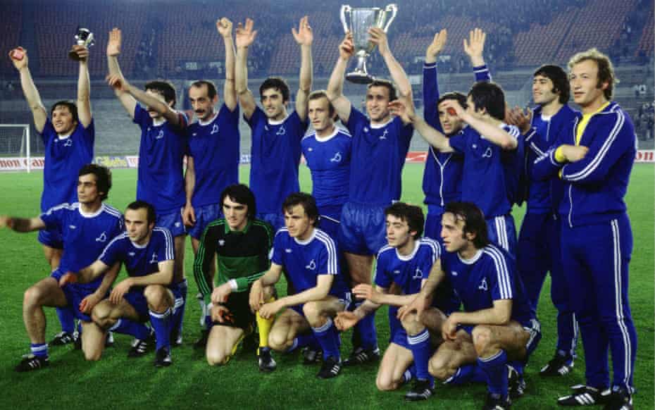 The Dinamo Tbilisi team celebrate with the European Cup Winner trophy.
