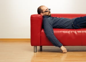 Man napping on sofa