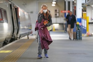 Greta Thunberg prepares to board a train to Glasgow at Euston Station in London on Saturday
