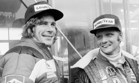 Niki Lauda, right, with his friend and rival James Hunt before the start of the Japan Grand Prix at Fuji in October 1976, less than three months after his accident. His damaged tear ducts made it impossible for him to blink, and he pulled out of the race after two laps.