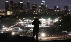 Mass Vaccinations as California Passes 3 Million. A person takes a photo of a mass Covid-19 vaccination site at Dodger Stadium, with the downtown skyline in the background, on January 22, 2021 in Los Angeles, California. California has become the first state in the nation to record 3 million known coronavirus infections.
