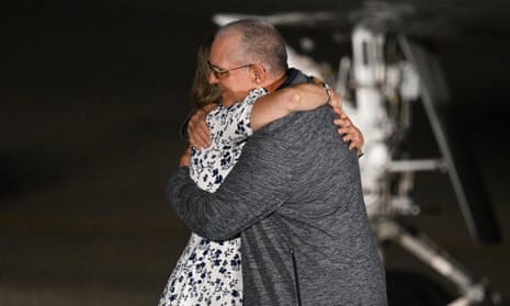 Former US Marine Paul Whelan hugs his sister Elizabeth Whelan as he arrives at Joint Base Andrews in Maryland on 1 August 2024.