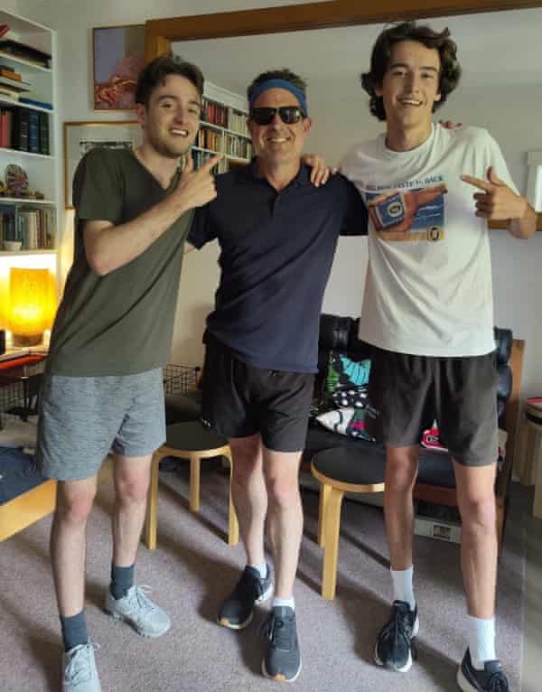 Benjamin Giles with his two sons after his Christmas Eve victory lap