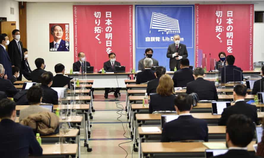 Yoshiro Mori addressing a mainly male audience at the Liberal Democratic party headquarters in Tokyo