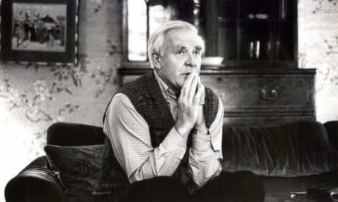 John le Carré on sofa, black and white picture