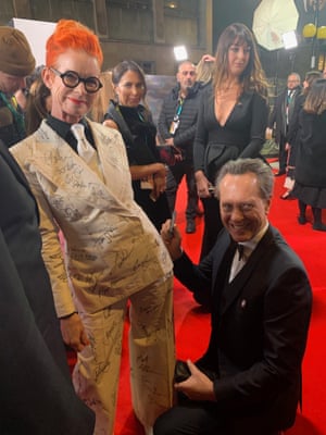 Powell with Richard E Grant.