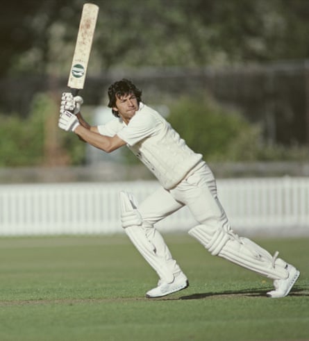 Imran Khan strikes a cricket ball and makes to run in a county game.