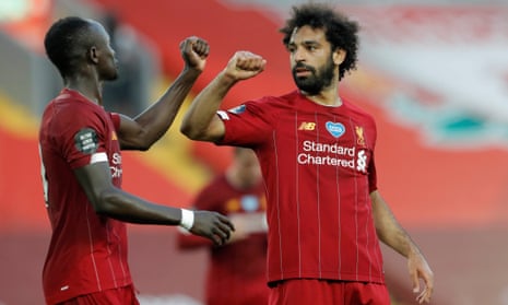 Liverpool’s Mohamed Salah (right) celebrates his goal with Sadio Mane.