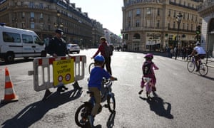 Cyclists at Place de l’Opera enjoy the ‘car-free day’.