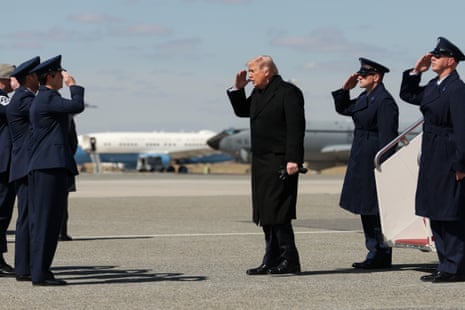 Donald Trump salutes as he arrived at in Delaware on Wednesday for a dignified transfer ceremony honoring six US service members killed in Iraq.