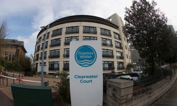 A nondescript, modern building with a sign outside featuring the logo of Thames Water and the name 'Clearwater Court'.