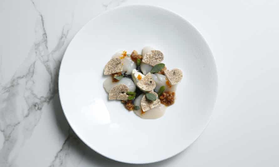 ‘Forest-floor flavours of puréed mushroom and hazelnut’: marinated scallop starter.