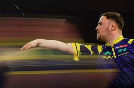 Luke Littler in action at the world darts championship