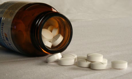 Tablets fall from a jar