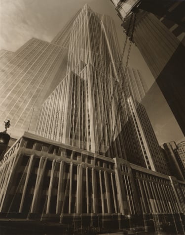the Empire State Building seen from the ground using a double exposure that exaggerated the building’s height and compressed its mass into a single, dizzying image