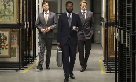Jack Cutmore-Scott, John Washington and Robert Pattinson in Tenet