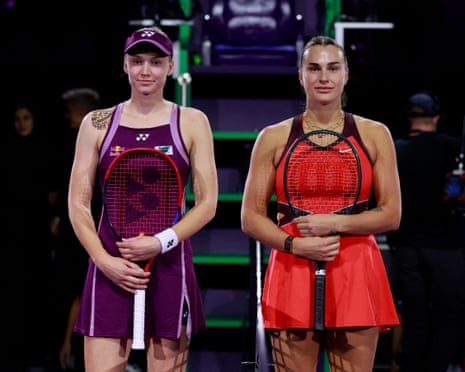 Kazakhstan’s Elena Rybakina poses with Belarus’ Aryna Sabalenka before their final match.