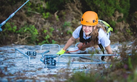 A teenager climbing Cornwall’s new Via Ferrata course.
