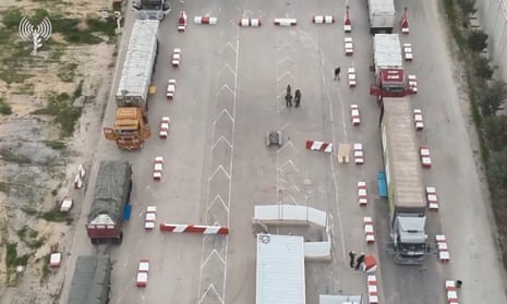Humanitarian aid trucks waiting in line to be inspected at the Kerem Shalom crossing, in an image released last week
