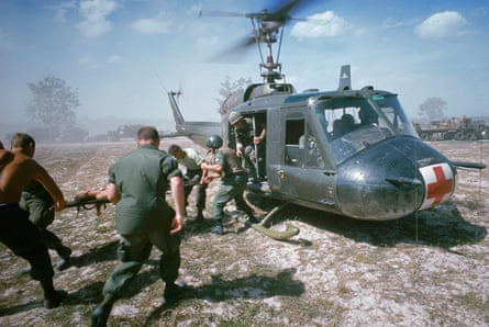 A helicopter airlifts wounded victims of a booby trap explosion.