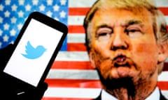 Company logo on a smartphone in Poland - 01 Jan 2021<br>Mandatory Credit: Photo by Filip Radwanski/SOPA Images/REX/Shutterstock (11698990c) In this photo illustration the Twitter social media app company logo seen displayed on a smartphone, face of Donald Trump and the United States of American flag seen in the background. Company logo on a smartphone in Poland - 01 Jan 2021