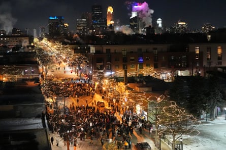 high angle photograph of a city street with a large crowd of people gathered