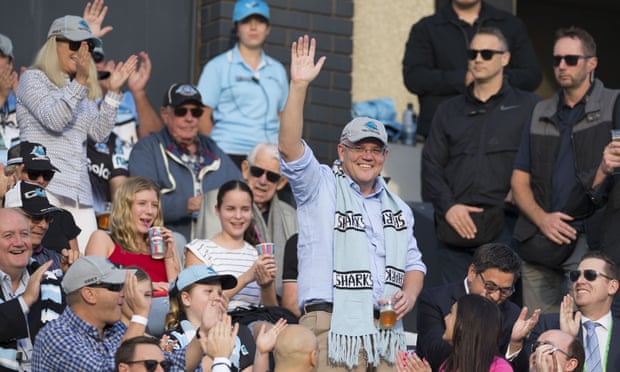 Scott Morrison waves to the crowd during the Round 10 NRL match between the Cronulla Sharks and the Manly Sea Eagles on Sunday.
