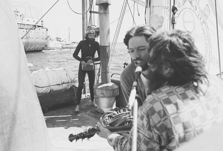 The Greenpeace crew playing music to the crew of the Soviet ships.
