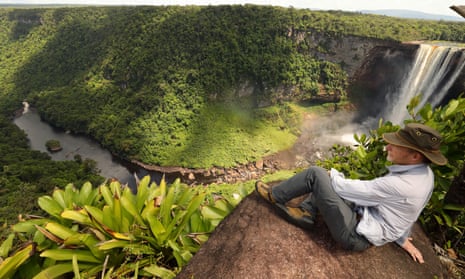 Kevin Rushby sitting above Kaieteur Falls