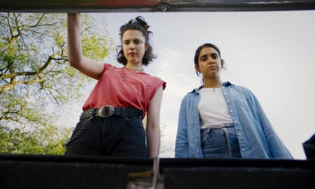 Margaret Qualley and Geraldine Viswanathan in Drive-Away Dolls, directed by Ethan Coen.