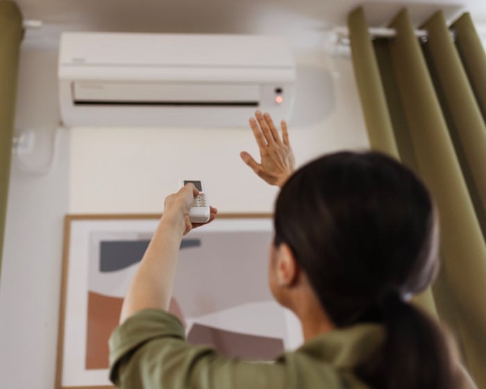 How do I feel about air conditioning? I’m very hot – but it’s destroying the planet | Emma Beddington