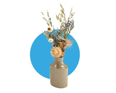 A bouquet of flowers in a ceramic vase.