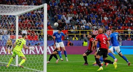 Alessandro Bastoni of Italy scores his team’s first goal to level the scores during the Euro 2024 group game between Italy and Albania.