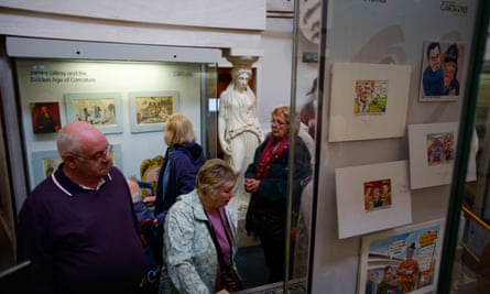 Older visitors look at displays in the Bank of England Museum.