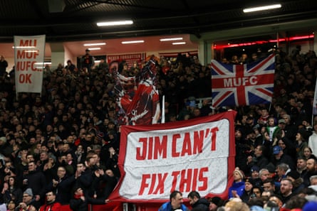 Manchester United fans display a banner in protest against co-owner Jim Ratcliffe