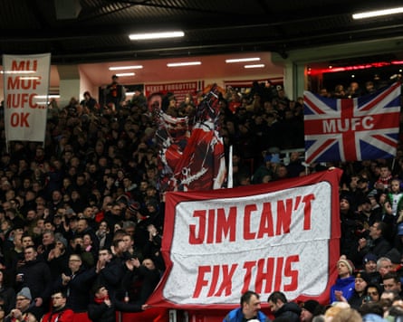 Fans display a banner reading 'Jim can't fix this' at a match against Brighton last month