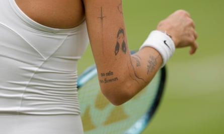 Marketa Vondrousova shows her tattoos during her victory over Elina Svitolina.