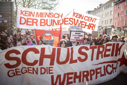 crowd of pupils holding up large school strike banners