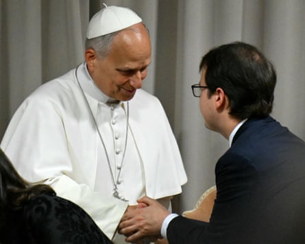 Man shakes hands with pope