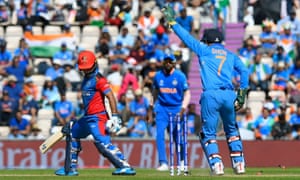 Hashmatullah Shahidi of Afghanistan survives a stumping attempt by MS Dhoni of India.