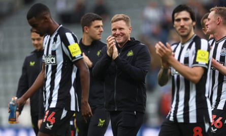 Eddie Howe applauds his players at St James’ Park